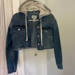 cropped jean jacket with grey hood